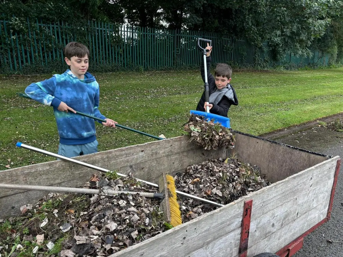 Edging and sweeping around Blackwater park green